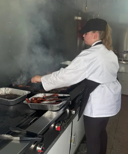Culinary students learning to serve